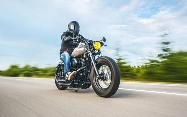 to lower the cost of motorcycle insurance, consider taking a safety course, maintaining a clean driving record, and bundling your motorcycle insurance with other policies